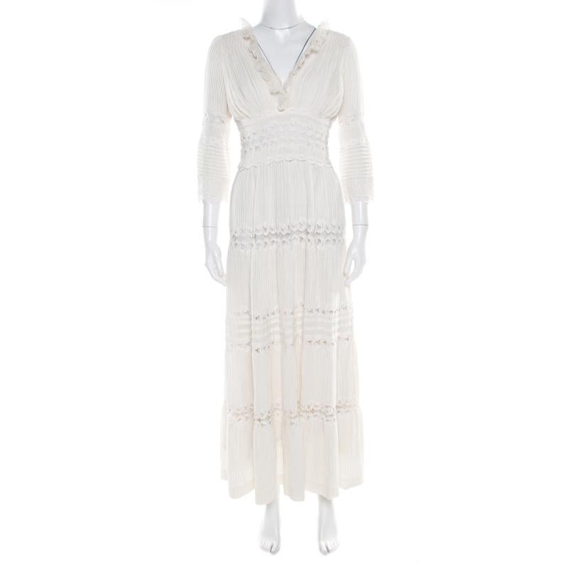 Feel and look elegant in this dress by Chloe. The cream linen dress brings a defined waistline, pintuck detailing and lace panels. A pair of flats or high heel sandals will look perfect with this creation.

Includes: The Luxury Closet Packaging

The