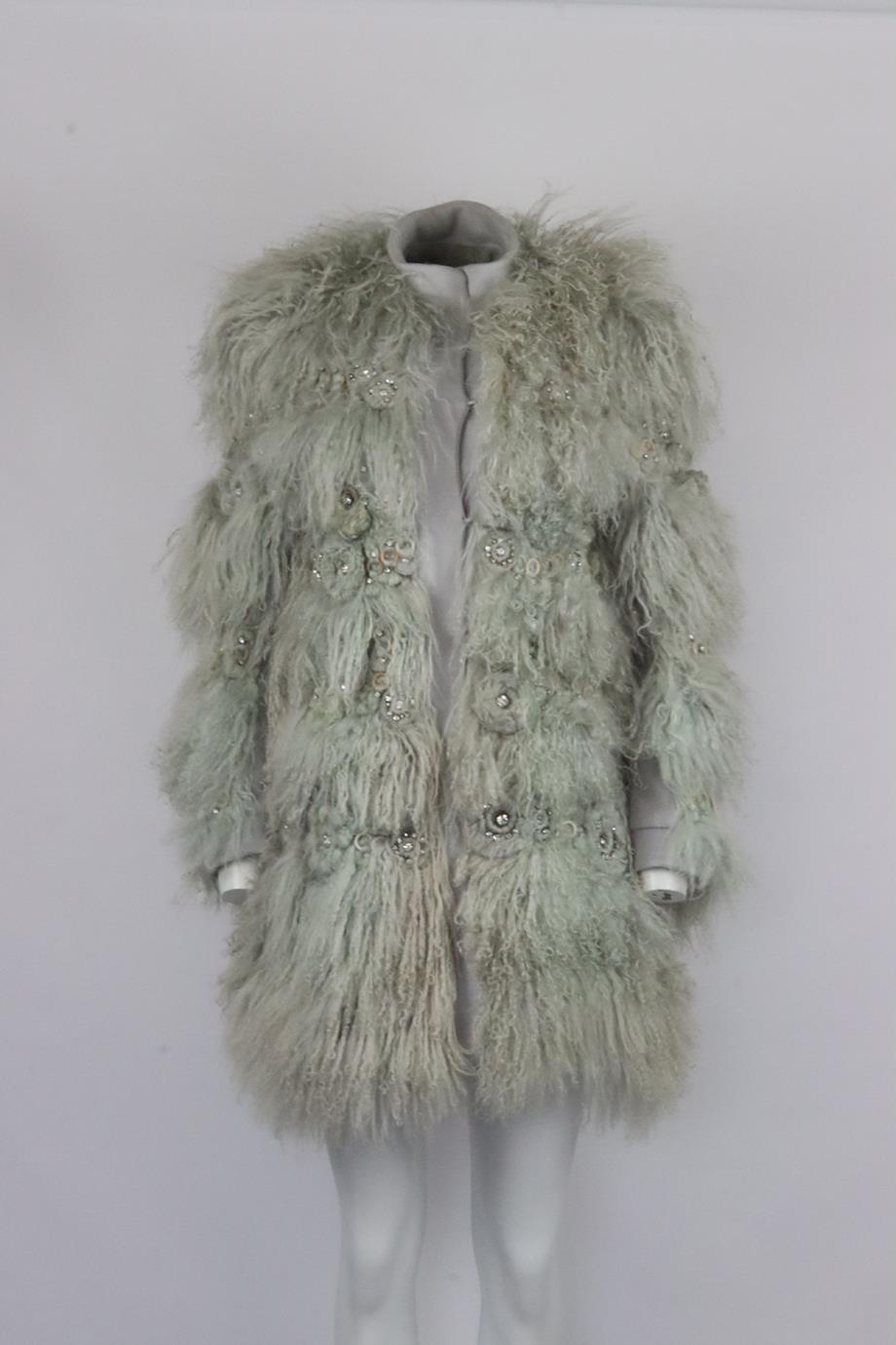 Chloé crystal embellished mongolian shearling coat. Blue. Snap button fastening at front. 100% Cashmere; fabric2: 70% wool, 30% cashmere; lining: 65% cotton, 35% silk. Size: FR 38 (UK 10, US 6, IT 42). Bust: 33 in. Waist: 33.5 in. Hips: 41.1 in.