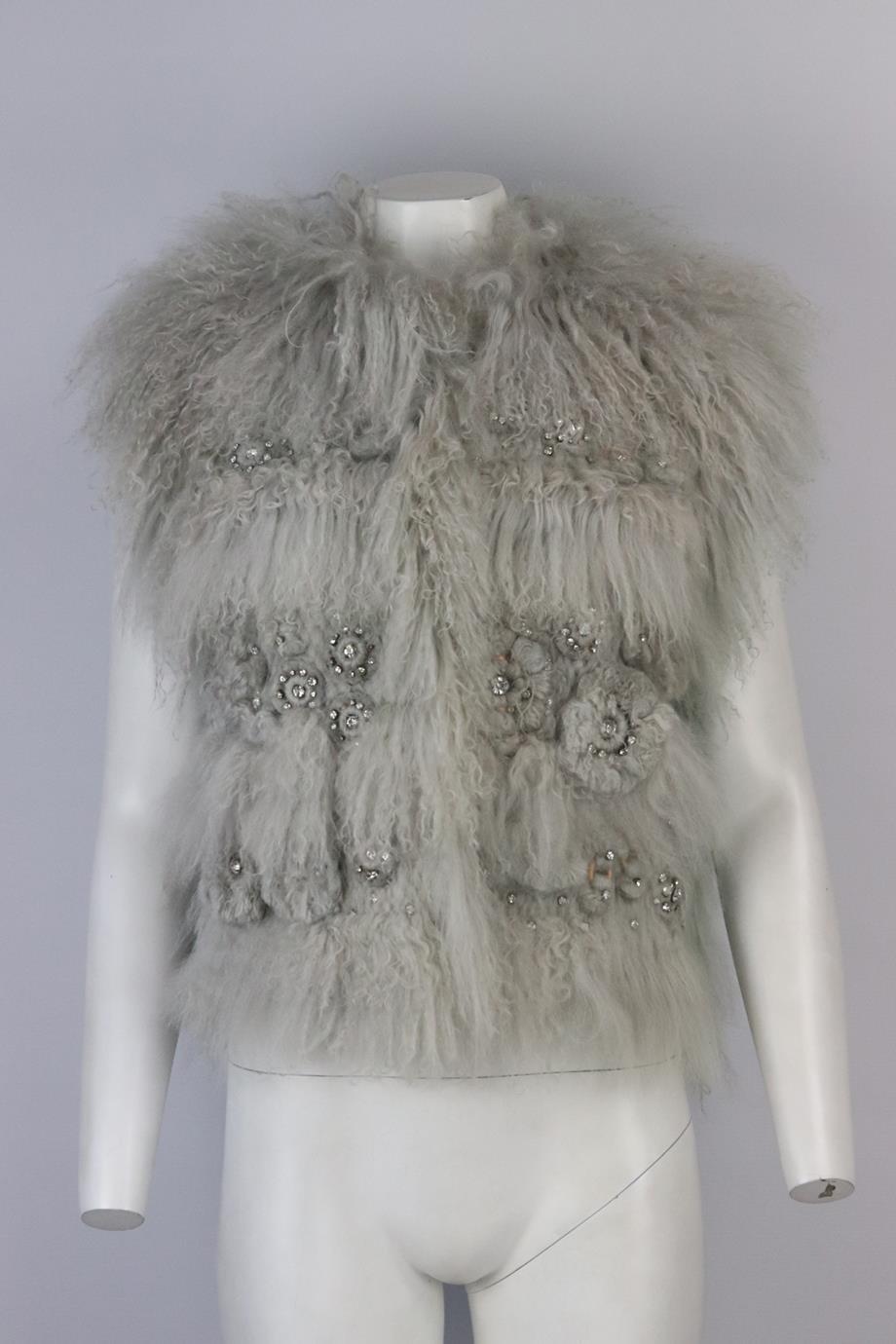 Chloé crystal embellished mongolian shearling gilet. Grey. Sleeveless, crew neck. Hook and eye fastening at the front. 100% Mongolian fur; lining: 70% wool, 30% cashmere. Size: FR 42 (UK 14, US 10, IT 46) Shoulder to shoulder: 16 in. Bust: 40 in.