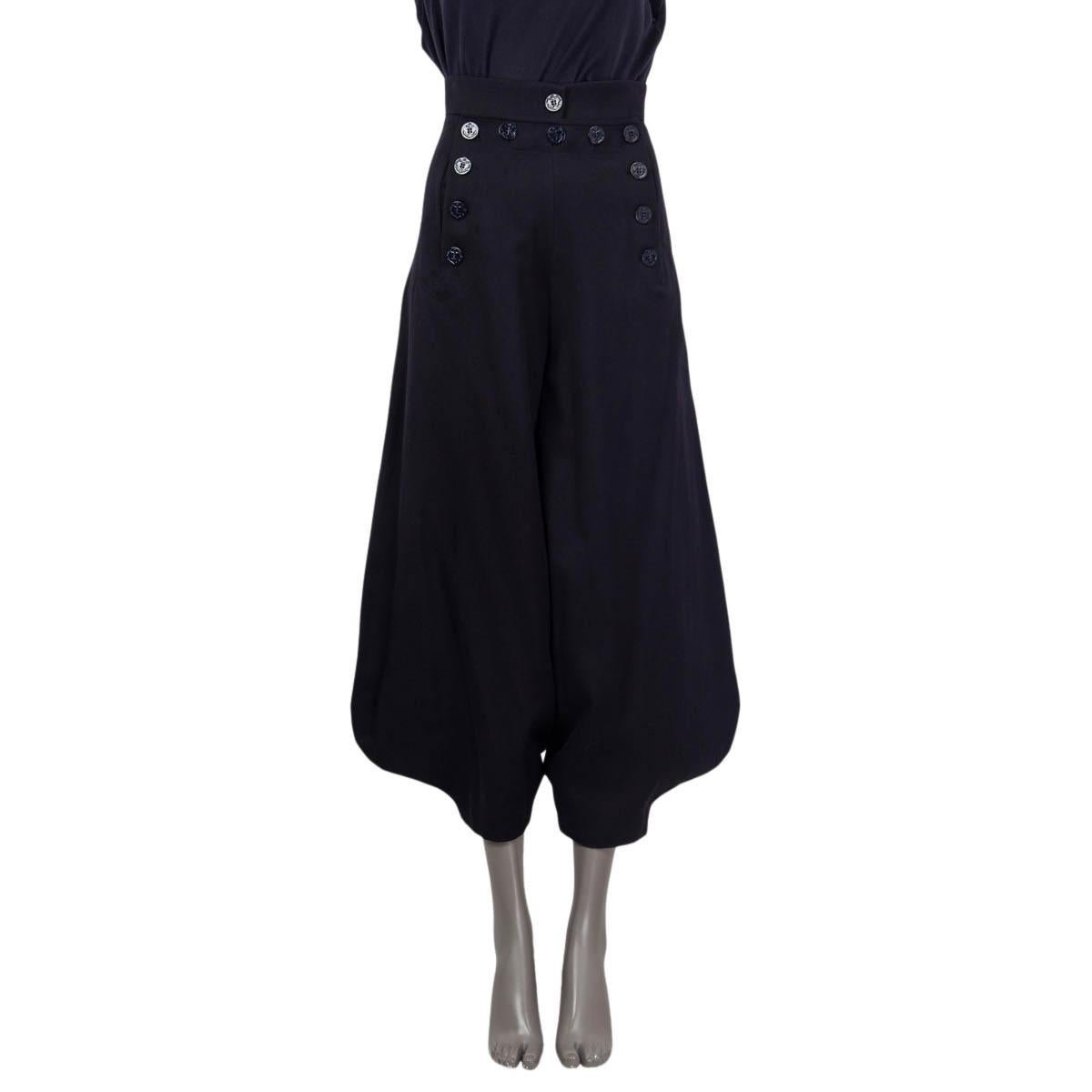 100% authentic Chloé balloon pants in dark blue virgin wool (63%) and cottom (37%). Features sailor buttons on the front and two slit pockets. Opens with eleven buttons on the front. Lined in anthracite blue cotton (100%). Have been worn and are in