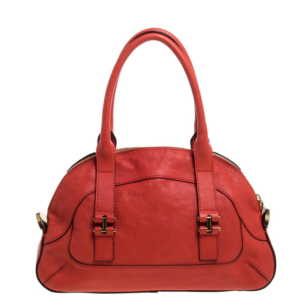 Characterized by a unique flap closure, this dome-shaped satchel from the house of Chloe is a chic way to carry your everyday essentials in style. Elegantly crafted from lush leather, this bag adds an exquisite touch to your casual attire and makes