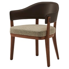 Chloe is a solid ash chair wrapped with a wraparound back.