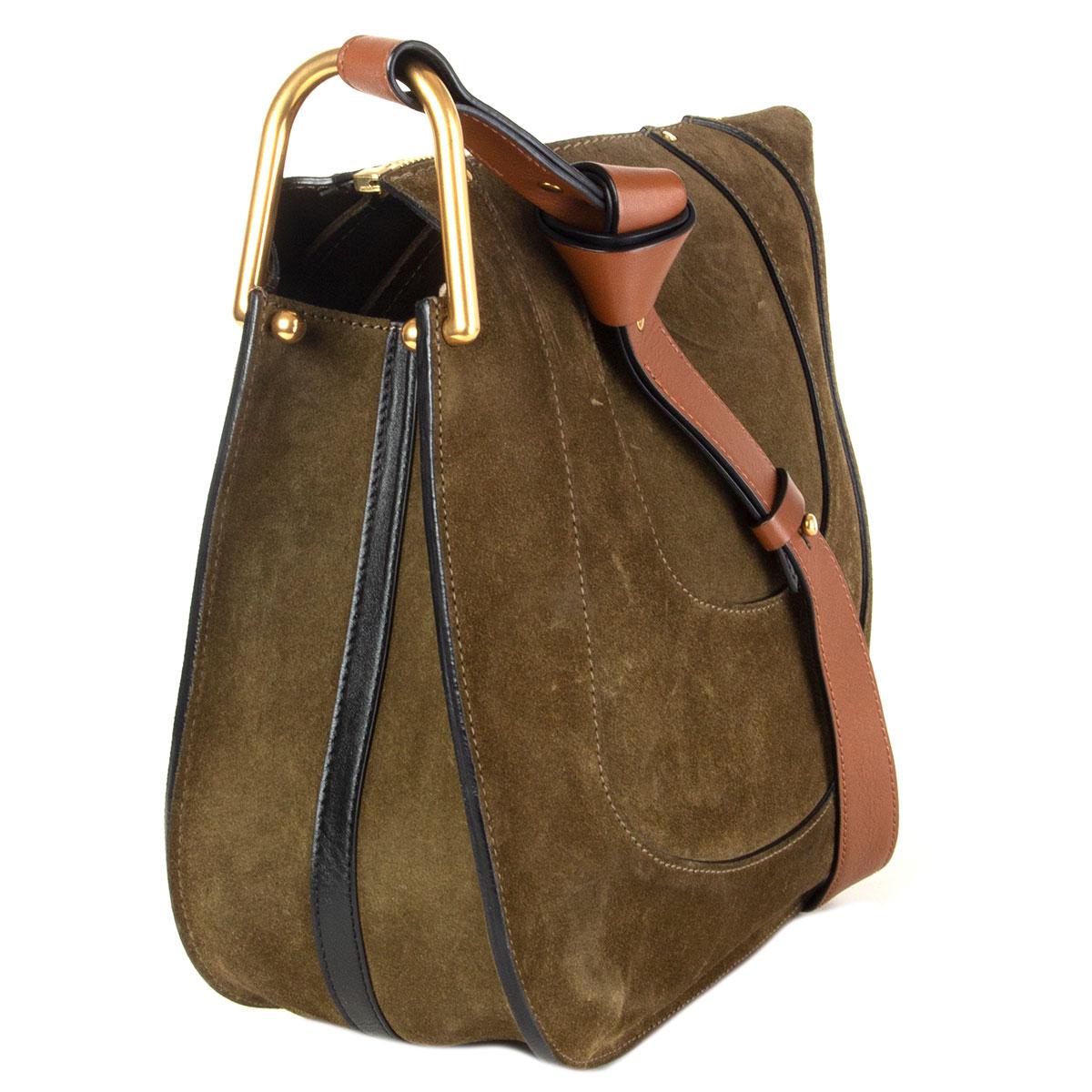 authentic Chloé Hayley hobo in Eucalyptus (olive green) suede featuring gold-tone hardware. Has a curved base and horseshoe stitching. Opens with a chain-zipper on top to a spacious interior with a big central zipped compartment with one open pocket