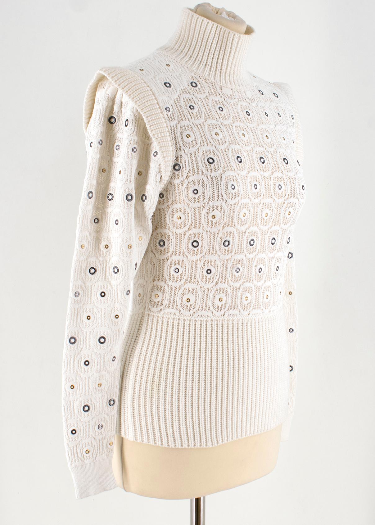 Chloe eyelet-embellished crochet-knit sweater 

- White, crochet knit 
- High neck, long sleeves 
- Ribbed-knit neck, cuffs and hem 
- Gold-tone and gunmetal eyelet embellished 
- Slip on 

Please note, these items are pre-owned and may show some