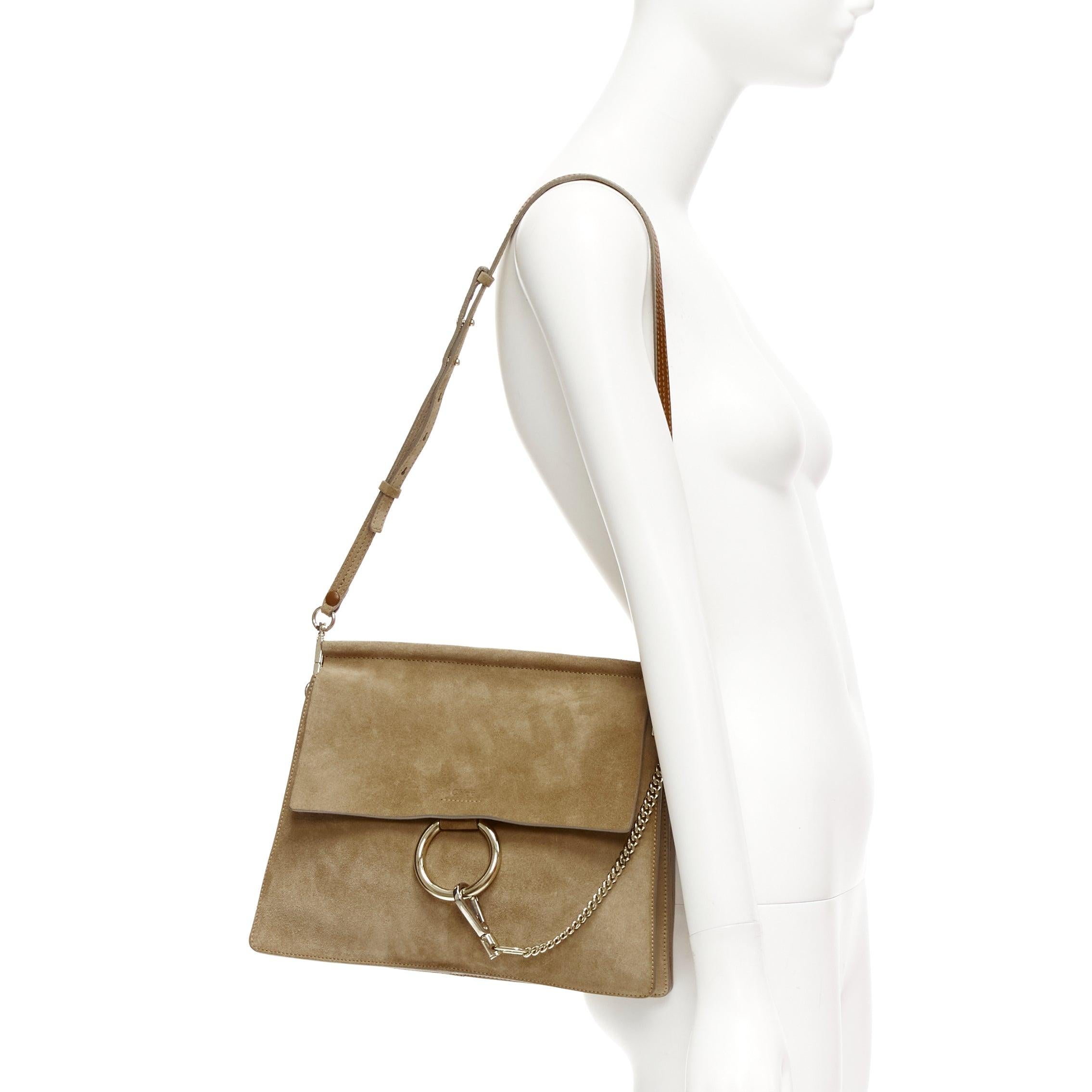 CHLOE Faye brown suede gold ring chain brown crossbody flap bag
Reference: NKLL/A00235
Brand: Chloe
Model: Faye
Material: Suede, Leather
Color: Brown
Pattern: Solid
Closure: Magnet
Lining: Brown Leather
Extra Details: Chloe Shoulder Bag. Neutrals