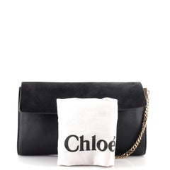 Faye Clutch aus Leder und Wildleder