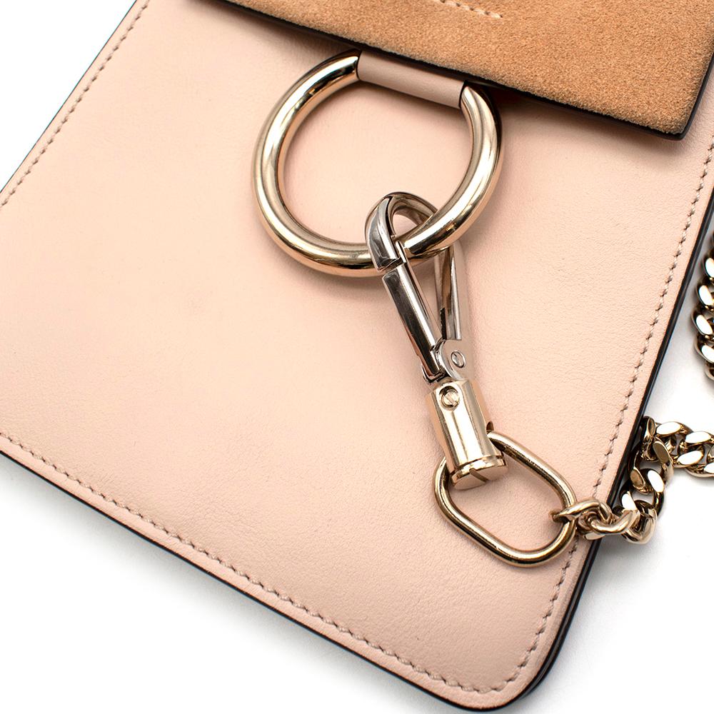 Chloe Faye Mini Cross-body Bag

- Suede & leather textures in baby pink and beige
- Silvery gold 'O' on the opening and handle
- Detachable chain detailing 
- Removable shoulder straps

Made in Spain

Fabric Composition: 
100% Leather &