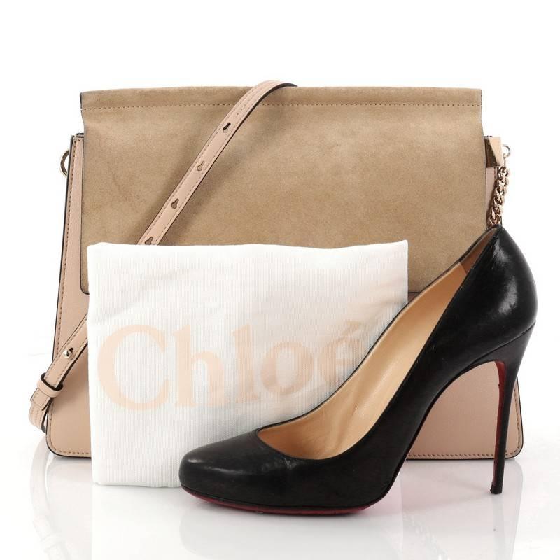 This authentic Chloe Faye Shoulder Bag Leather and Suede Medium personify Chloe's unique luxe bohemian aesthetic with an ode to the 70's. Crafted in beige leather and suede, this sleek bag features a ring with chain, gusseted sides, stamped logo at