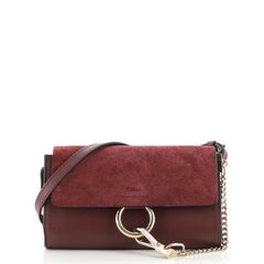 Schultertasche aus Leder und Wildleder von Faye Mini