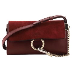 Mini-Umhängetasche aus Leder und Wildleder von Faye