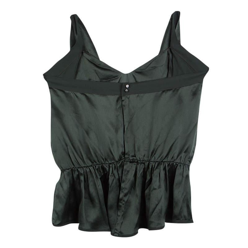 This top from Chloe is one item your closet will love. Tailored from quality silk, it has drape details, a high low peplum hem, and back fastenings. Cut into a silhouette that is feminine and stylish, this forest green number is a must-buy.

