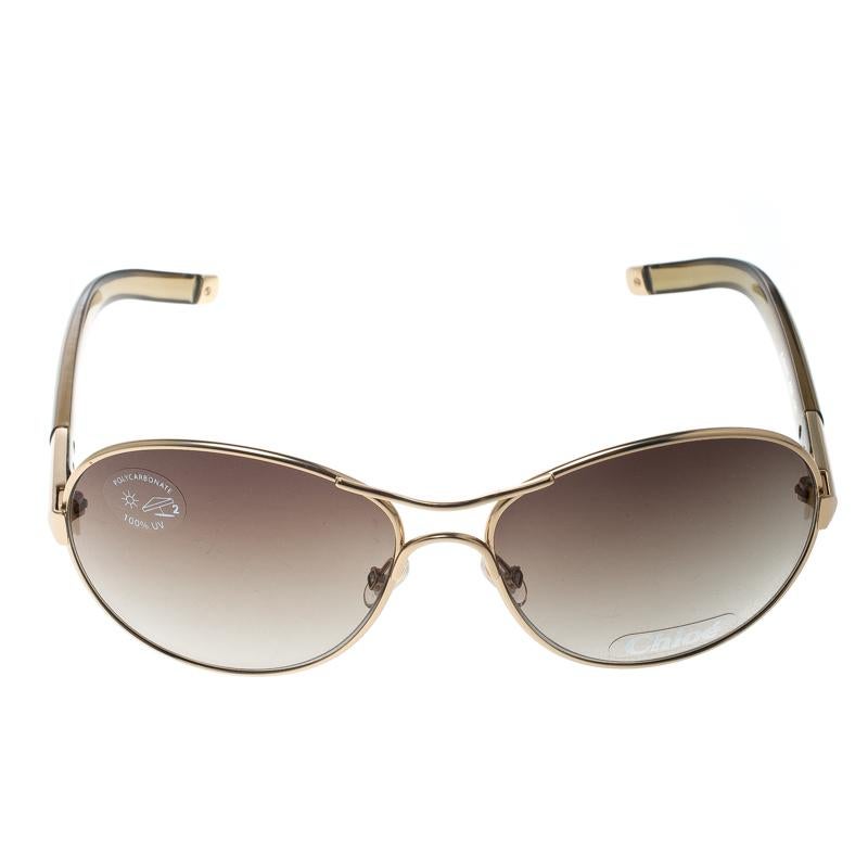 A frame style that can never go out of style, aviators have the charm that brightens your look instantly. These sunnies from Chloe flaunt that timeless frame style rendered in gold-tone metal along with brown gradient lenses that offer maximum