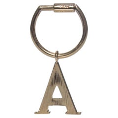 Chloe, gold metal pendant