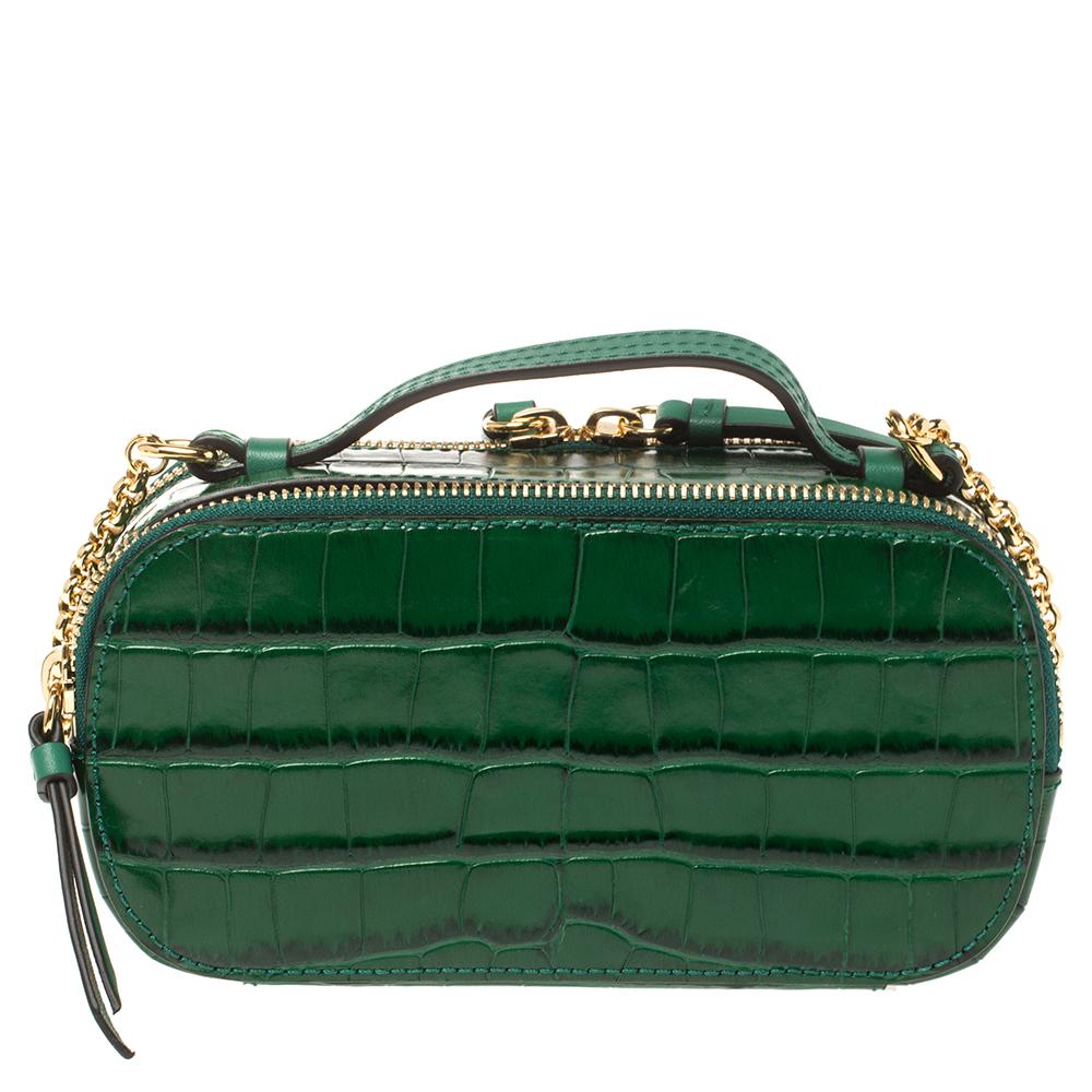 Chloé's Vanity bag is a part of the much-loved C collection and has a rounded, structured silhouette that's particularly sleek and classy. Made from croc-effect leather, it's the rich green shade that beautifully complements the gold-tone hardware.