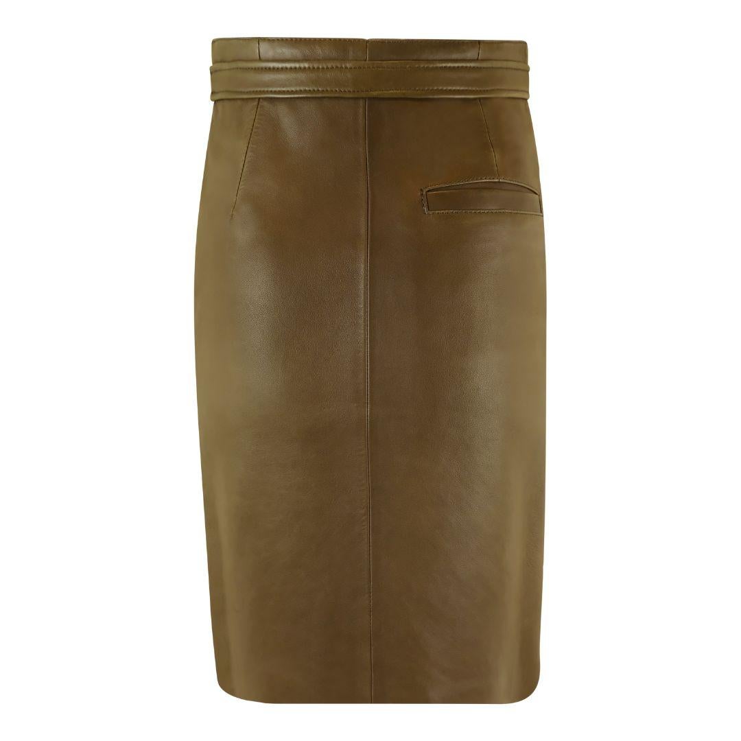 Chloe utility skirt in soft army green colored lamb leather with extra large front double pockets with flap closure. Knee length with a straight, pencil silhouette. Features a single back, right pocket.

Condition Details: Very good preowned