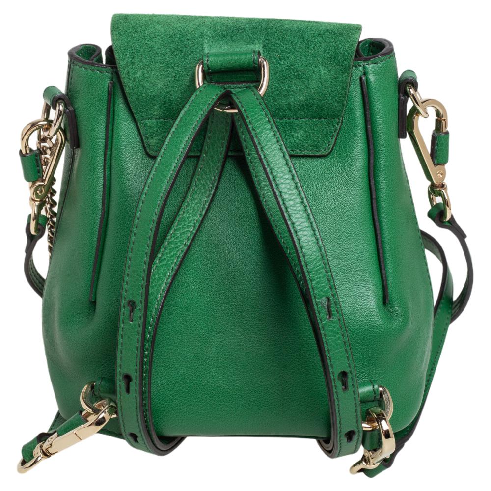 You are going to love owning this Faye Daye backpack from Chloe as it is well-made and brimming. The bag has been crafted from leather and designed with a suede flap exhibiting a ring and chain detail and a well-sized canvas interior for your