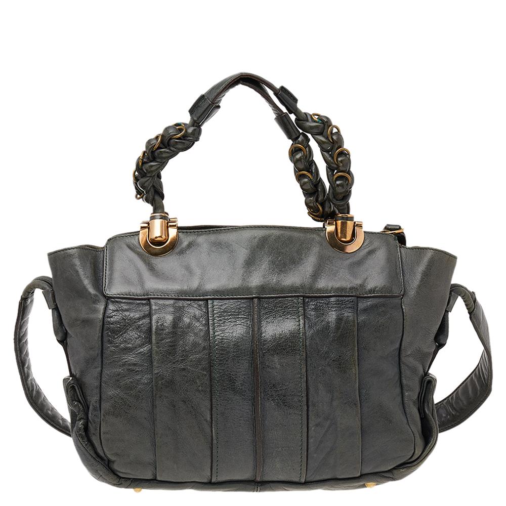 Coveted by fashionable women around the world, the Heloise is a bag worth the price. It is from the luxury brand, Chloe. The bag is crafted from green leather and designed with braided handles, gold-tone hardware and a spacious fabric