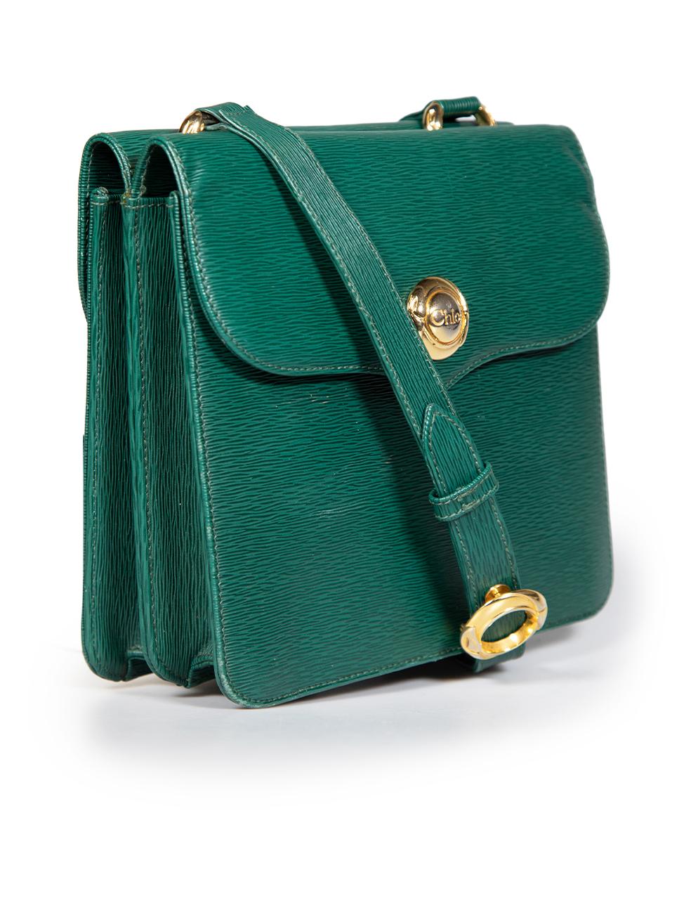 CONDITION is Good. Minor wear to bag is evident. Light signs of wear with scratches and abrasions on the top, front, back, under the flap and internal leather in both compartments. Scratches to the hardware. Creased leather on the front and back at