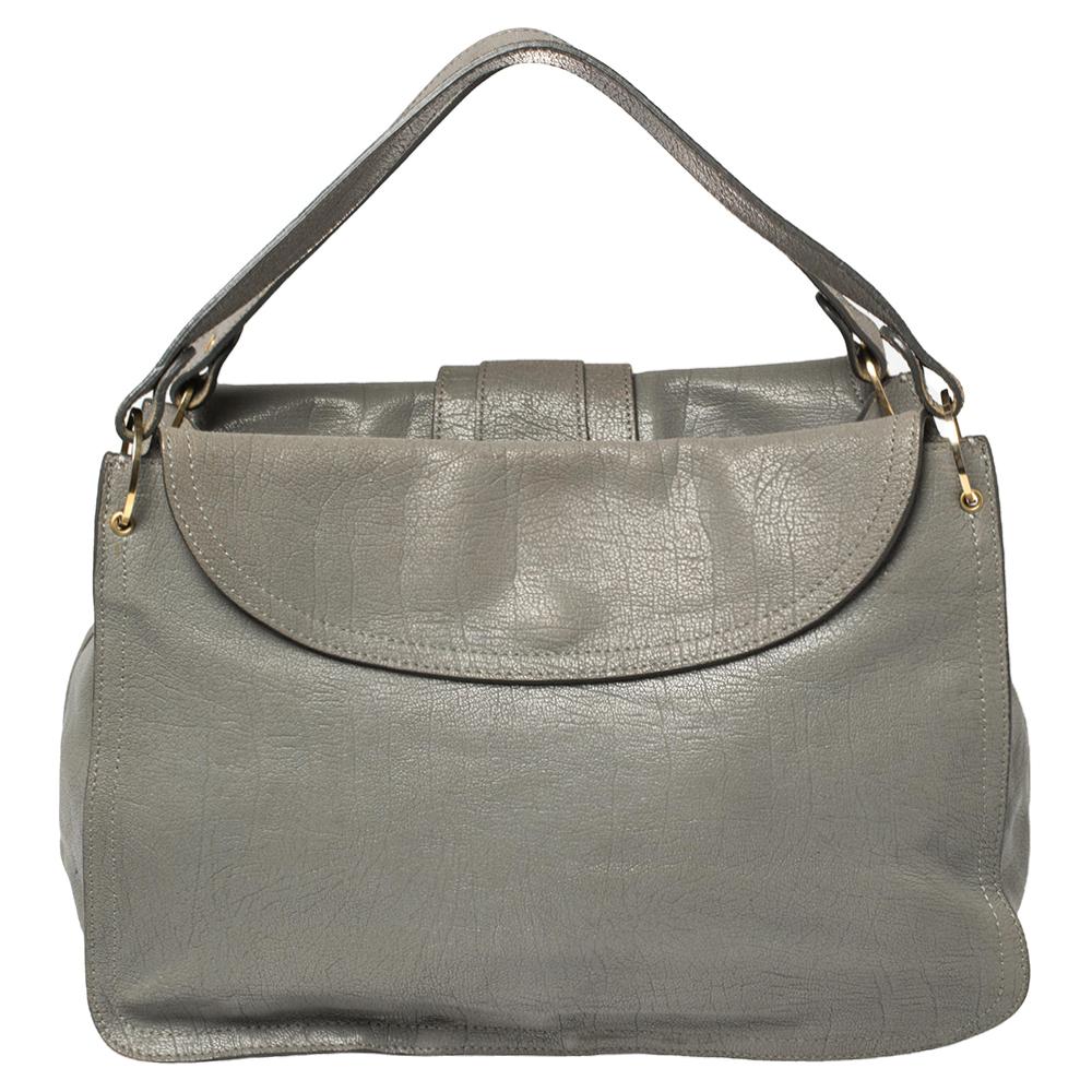 Characterized by a unique flap closure, this satchel from the house of Chloe is a chic way to carry your everyday essentials in style. Elegantly crafted from lush leather, this grey bag adds an exquisite touch to your casual attire and makes sure