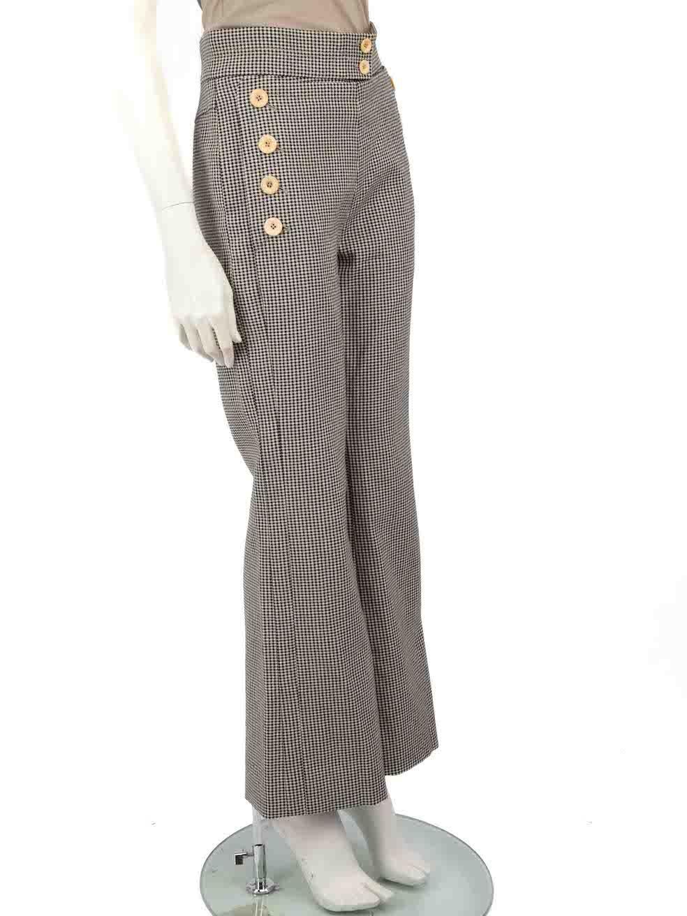 CONDITION is Very good. Hardly any visible wear to trousers is evident on this used Chloé designer resale item.
 
 
 
 Details
 
 
 Grey
 
 Wool
 
 Trousers
 
 Houndstooth pattern
 
 Straight leg
 
 Front button detail
 
 2x Side pockets
 
 Side zip