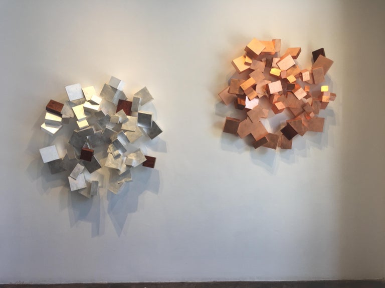 *materials; Copper Leaf on Paulownia with Boire Facets

This series by Chloe Hedden and Bill Hedden explores the growth forms of the mineral pyrite.  Pyrite or 'fools gold' grows in organic ever expanding interconnected cubes. This father daughter