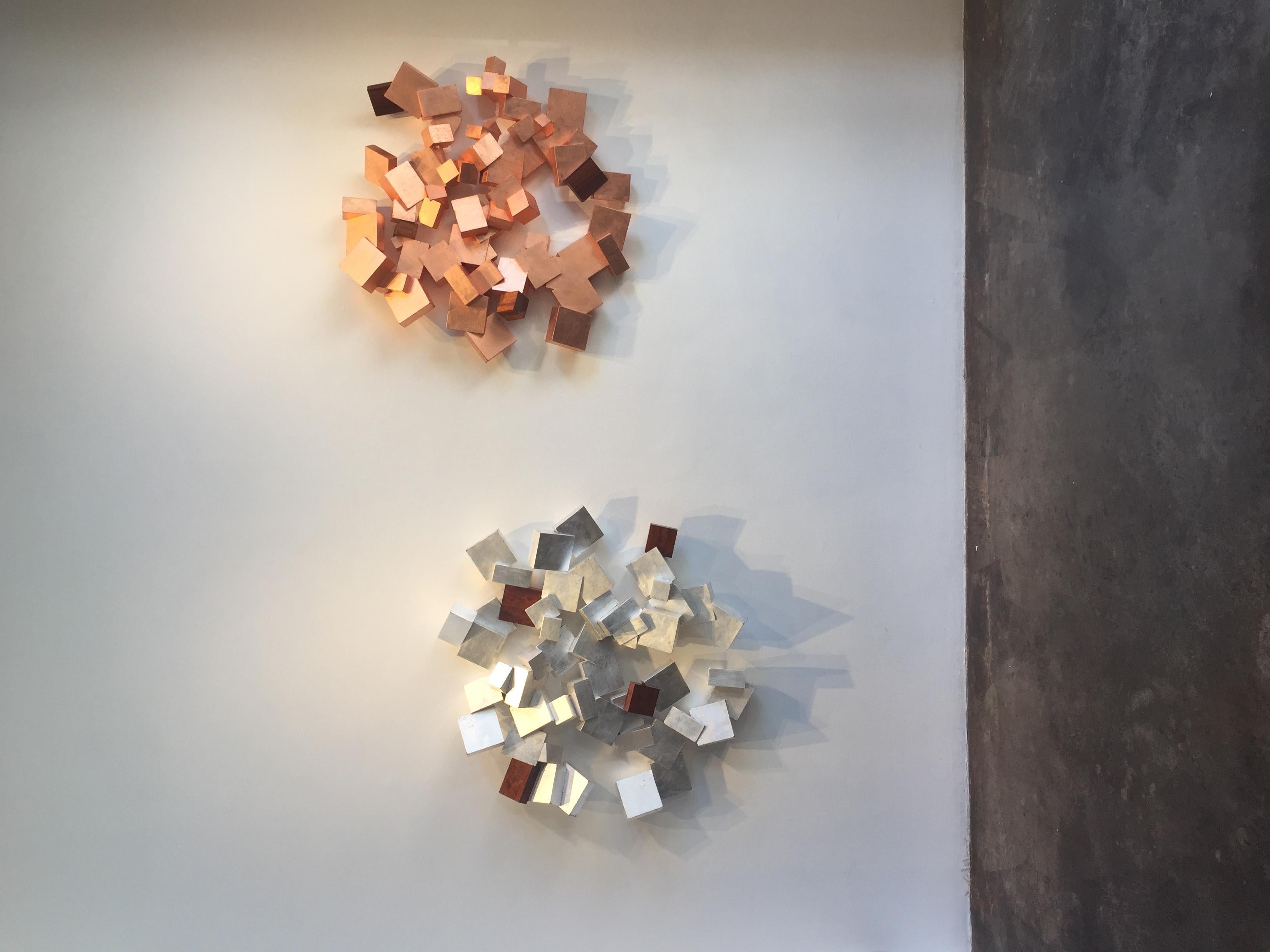 *materials; Copper Leaf on Paulownia with Boire Facets

This series by Chloe Hedden and Bill Hedden explores the growth forms of the mineral pyrite.  Pyrite or 'fools gold' grows in organic ever expanding interconnected cubes. This father daughter