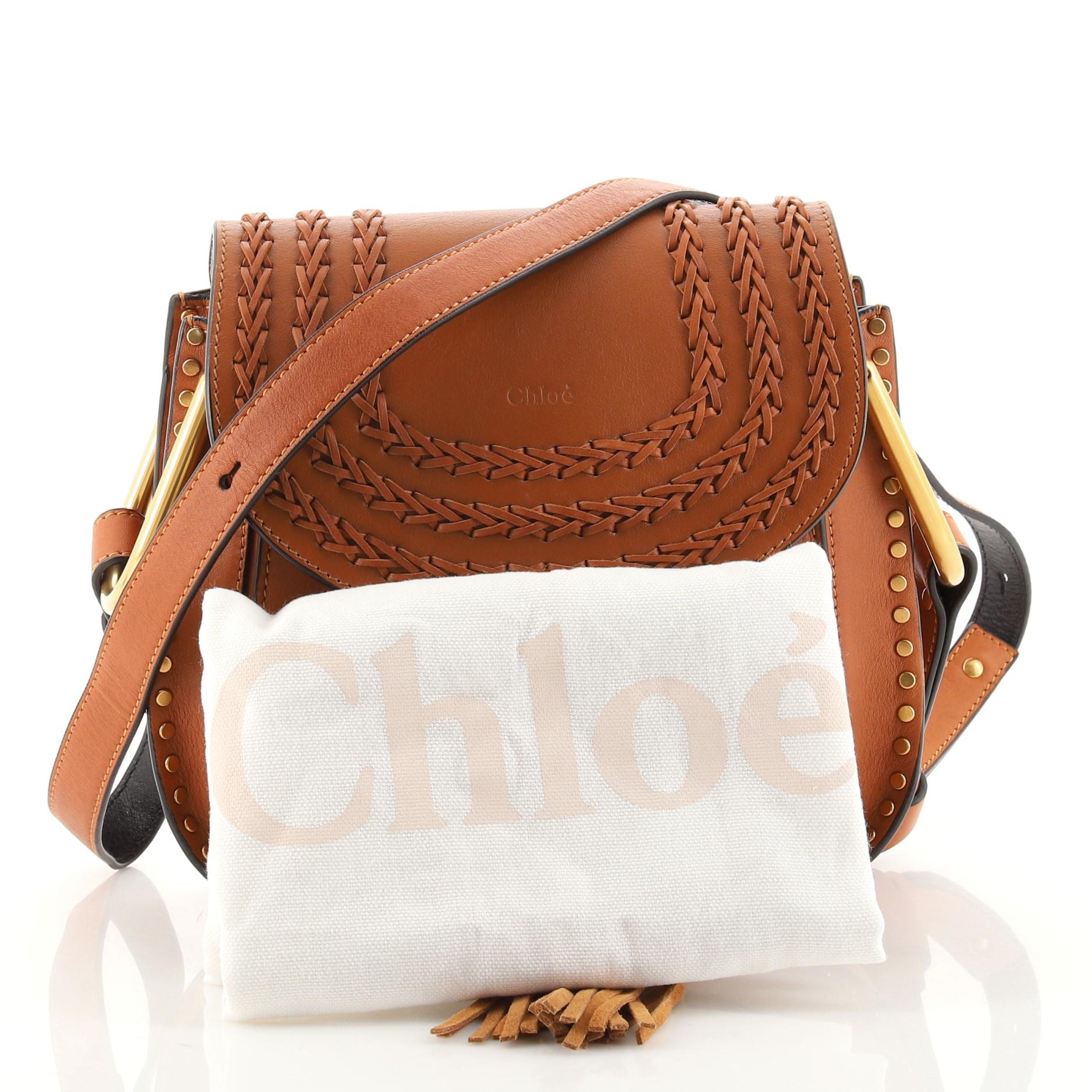 Condizioni: Ottimo. Usura e graffi sull'esterno e sul cinturino, pieghe sul cinturino, graffi e leggero scolorimento sull'hardware.
Accessori: Borsa per la polvere
Misure: Altezza 8