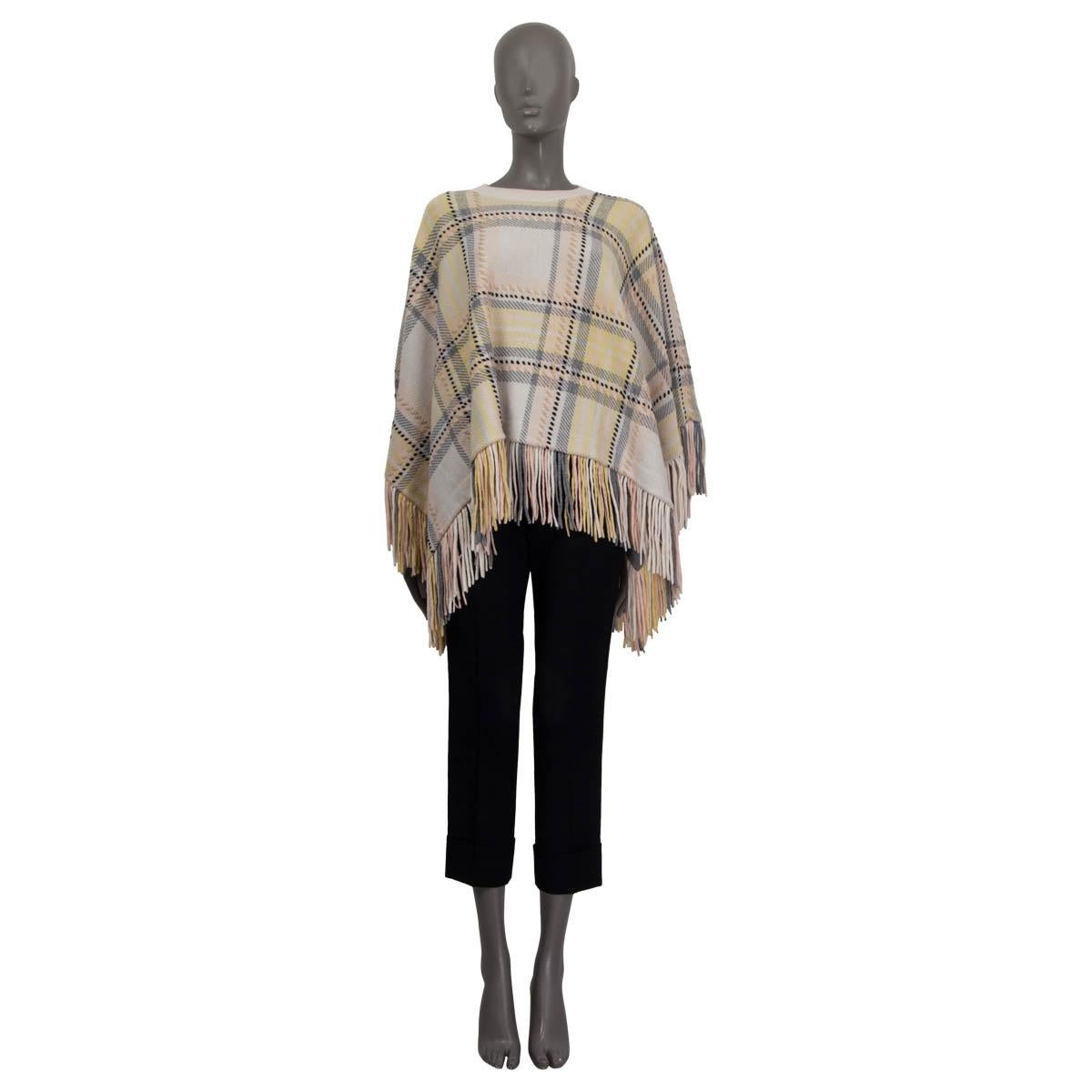 100% authentic Chloe plaid knit poncho in nude, pale pink, pale gray and pale yellow wool (95%) and cashmere (5%). Features a fringed hemline. Unlined. Has been worn and is in excellent condition.

Measurements
Tag Size	XS-S
Size	S
Bust From	160cm