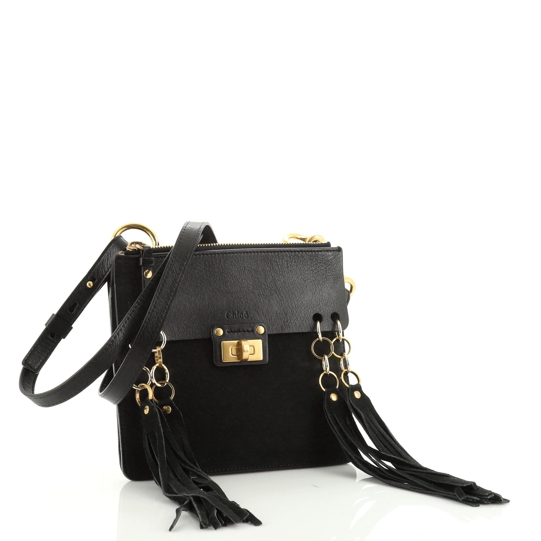 This Chloe Jane Crossbody Bag Leather and Suede Small. crafted from black leather, features an adjustable crossbody strap, front flap with swingy multicolor tassels and turn-lock detail, slip pocket under flap and gold-tone hardware. It opens to two