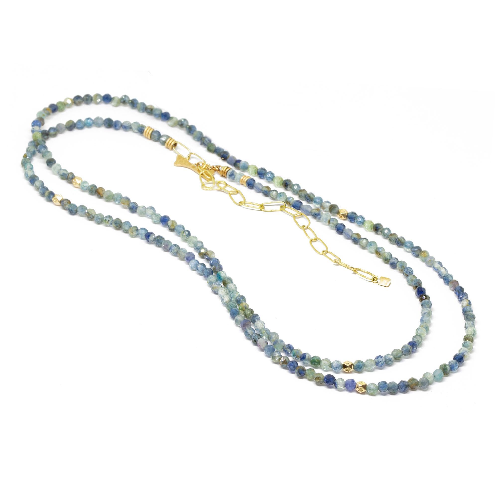 The best part about our Chloe Gold Gemstone Convertable Wrap isn’t just that it can be worn long, doubled-up, or as a wrap bracelet (although that’s pretty cool). It’s that you can thread any of our Charms onto the kyanite beads—have fun playing