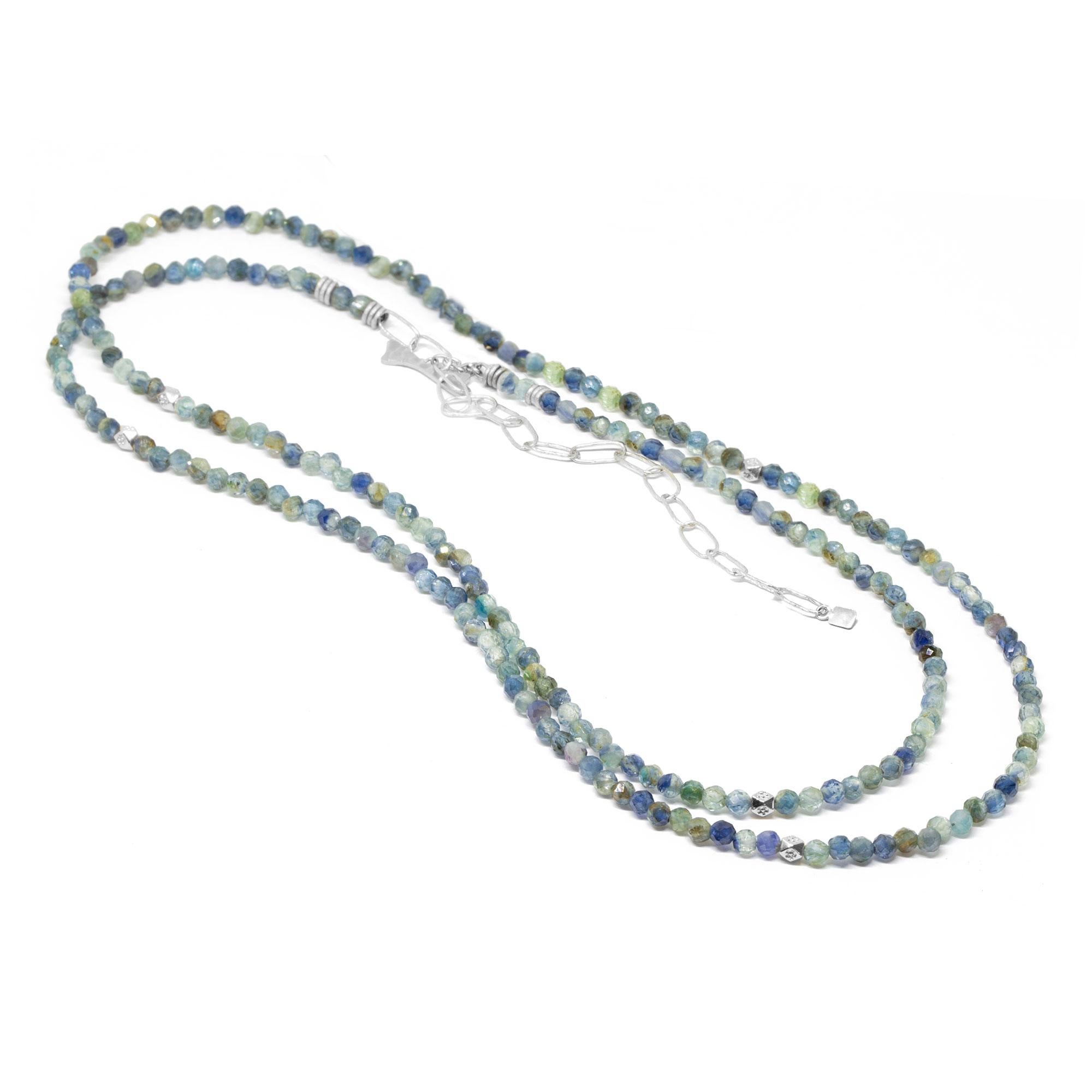 The best part about our Chloe Silver Gemstone Convertable Wrap isn’t just that it can be worn long, doubled-up, or as a wrap bracelet (although that’s pretty cool). It’s that you can thread any of our Charms onto the kyanite beads—have fun playing