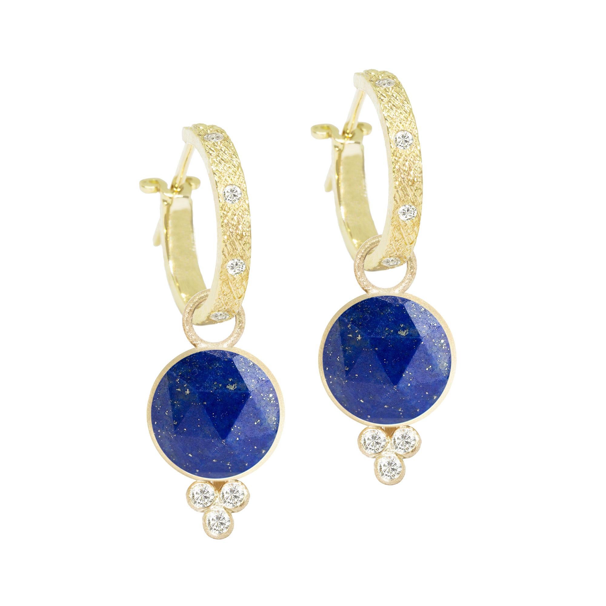 A Nina Nguyen classic to collect and treasure: Our diamond-accented Chloe Gold Charms are designed with lapis rimmed in gold. They pair with any of our hoops and mix well with other styles.
Nina Nguyen Design's patent-pending earrings have an