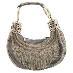 Chloe - Borsa a mezzaluna impreziosita da catene in denim blu chiaro