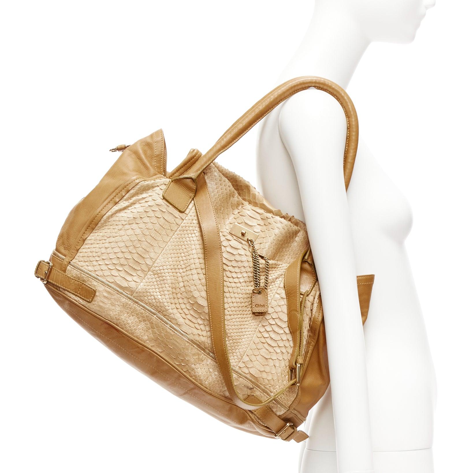 CHLOE Marlow Dune tan scaled leather logo army tag belted top handle bag
Reference: CELG/A00405
Brand: Chloe
Model: Marlo Dune
Material: Leather
Color: Beige, Brown
Pattern: Animal Print
Closure: Zip
Lining: Grey Fabric
Extra Details: Beige python