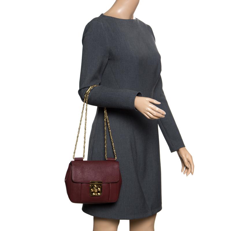 Every accent on this Chloe bag is magnificent which makes the creation worthy of being owned. It has been crafted from leather and styled with a flap that has a turn lock leading to a well-sized interior. The luxurious piece is complete with a