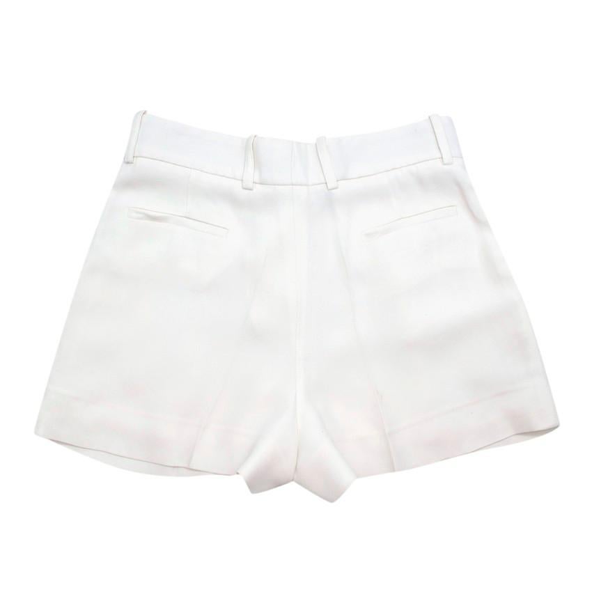  Chloe Milk Crepe Pleated Shorts

- Designed with a very flattering feminine A-line silhouette
- Perfectly tailored in lustrous crepe
- High rise
- Neatly detailed with pleats at front 
- Darted at the back to ensure a perfect fit
- Fully lined
-