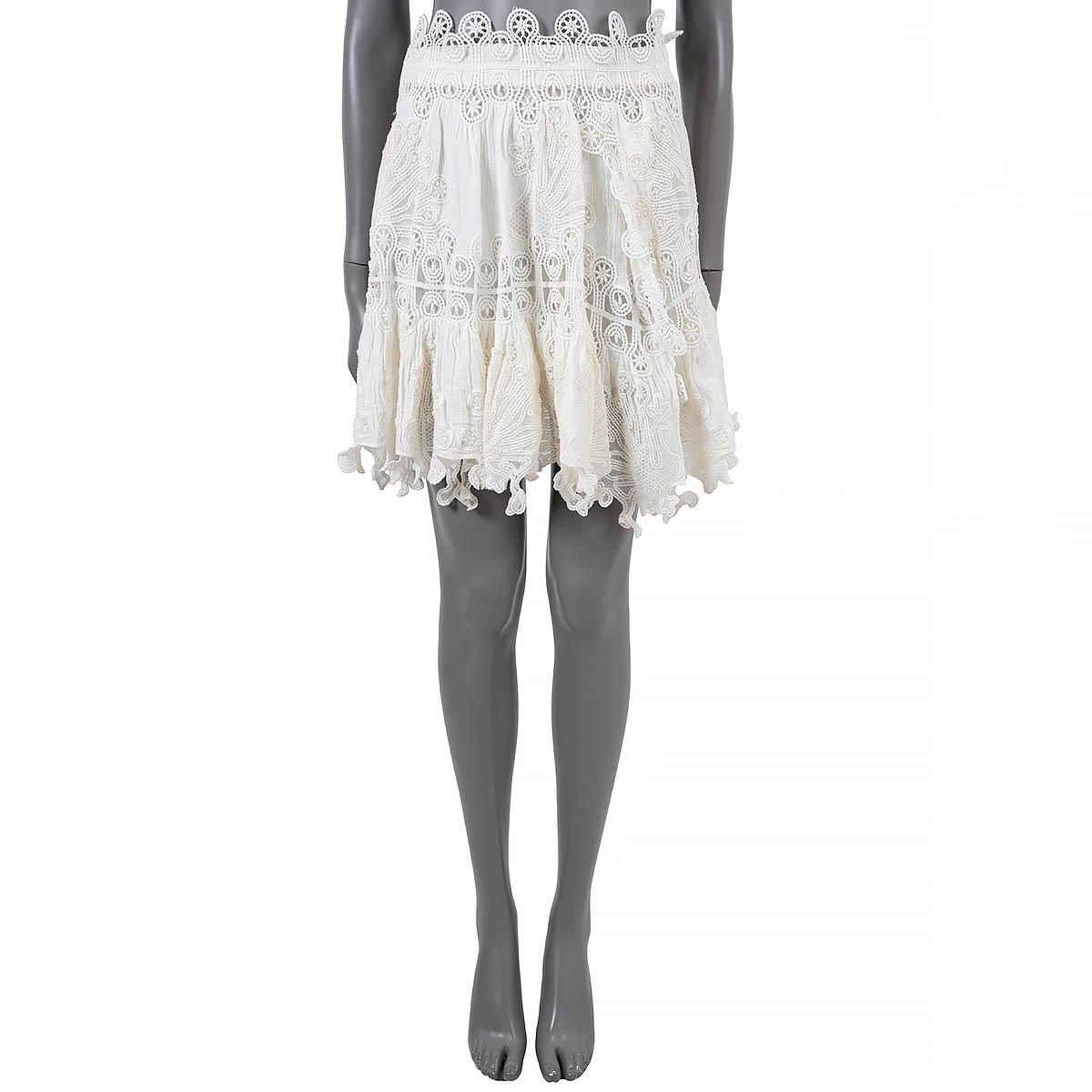 100% authentic Chloé short skirt in Milk (ivory) peacock embroidered lace (linen blend - content tag is barely legible). The design features a zipper on the back and lined in ivory linen (65%) and polyamide (35%). Has been worn once or twice and is