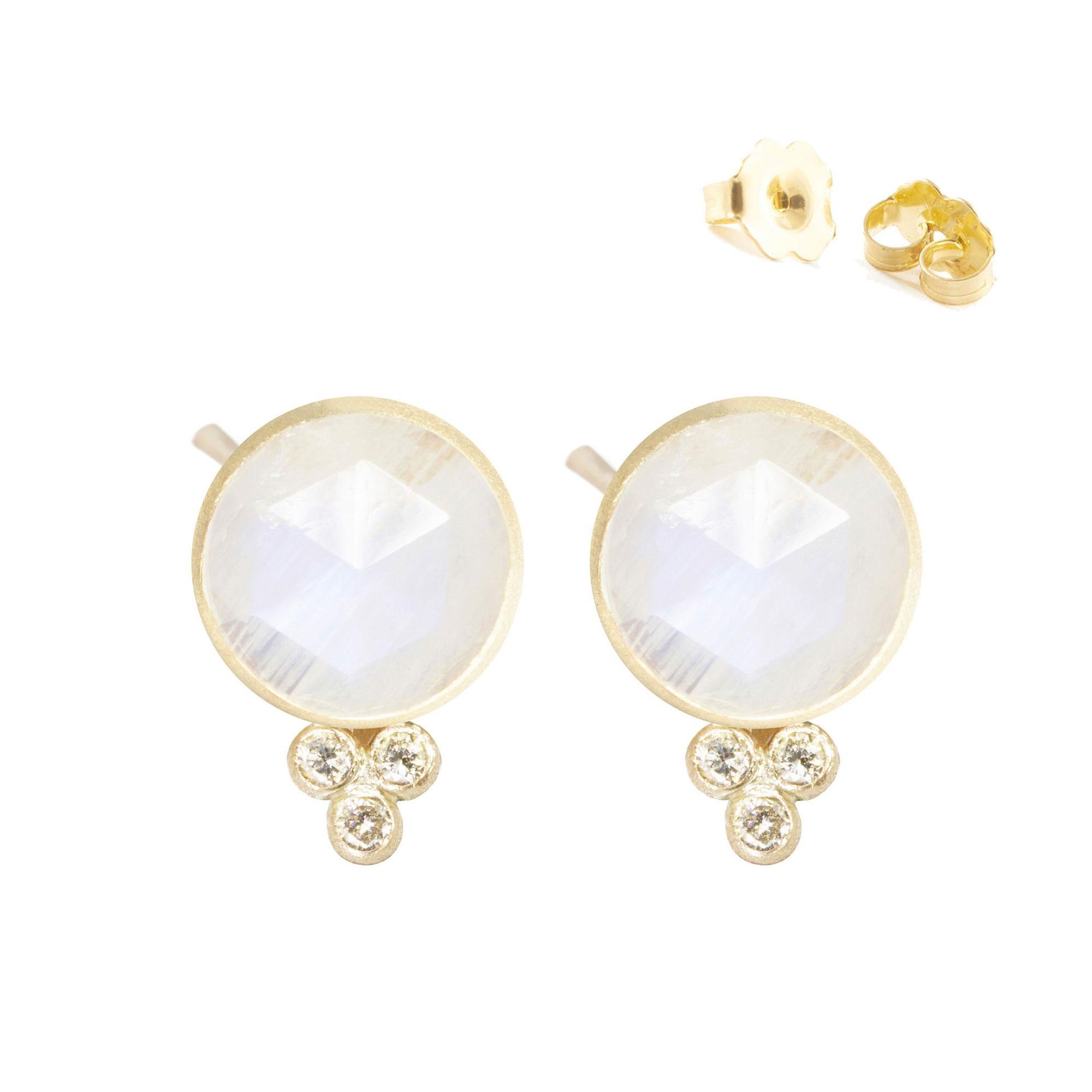 A Nina Nguyen classic: Our Chloe Gold Studs are designed with hand-faceted moonstone rimmed in gold, and accented with diamonds for some extra sparkle.

Nina Nguyen Design's patent-pending earrings have an element on the back of the stud or charm to