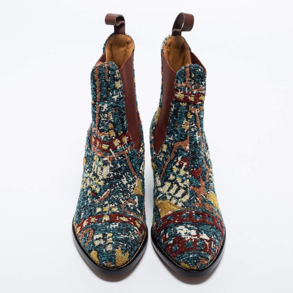 These Chelsea boots from the House of Chloe are super stylish and will definitely incorporate a luxe element into your attire. They are crafted using multicolored tweed into an ankle-length silhouette. Update your shoe collection with these
