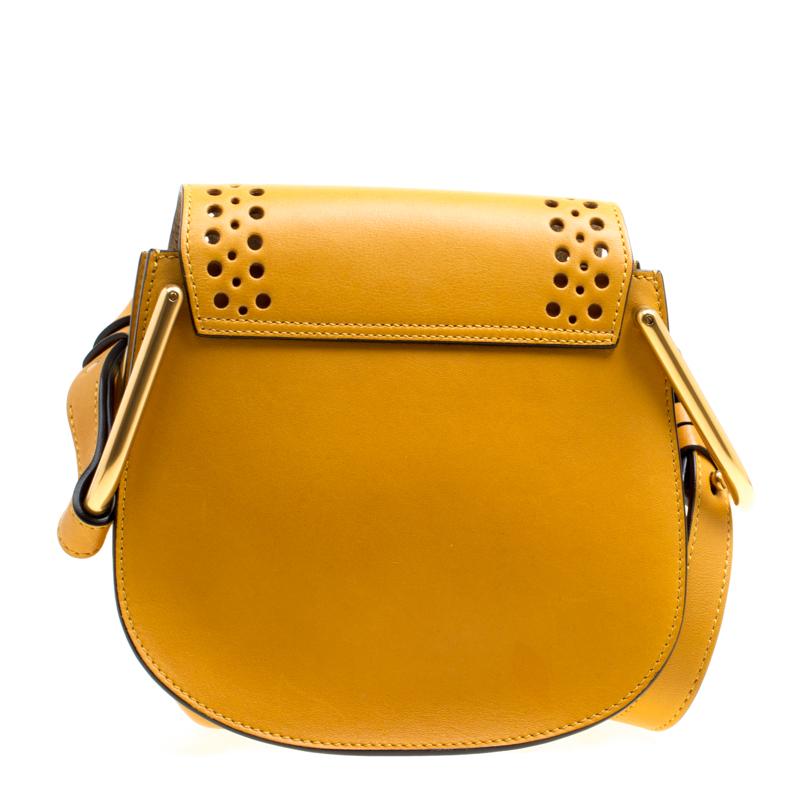 The beautiful and unique Chloe designs have been ruling the luxury fashion circuit for quite some time, and this Mini Hudson shoulder bag is sure to steal the show. Crafted in pretty mustard leather, this beautiful and stylish bag features a