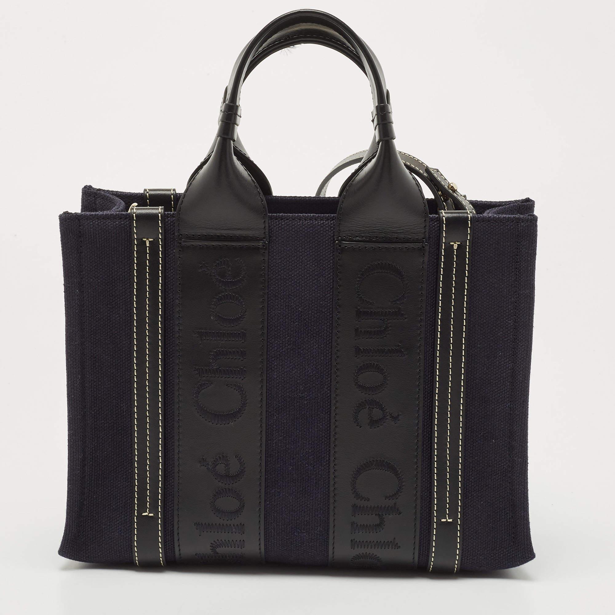 If you like traveling light, then this Chloe Woody tote is an ideal option for you. It is the ultimate favorite of the fashion elite because of its versatility and classy appeal. Created from canvas and leather, it exhibits brand-detailed stripes on