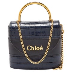 Petit sac Aby Lock de Chloe en cuir et crocodile bleu marine/noir