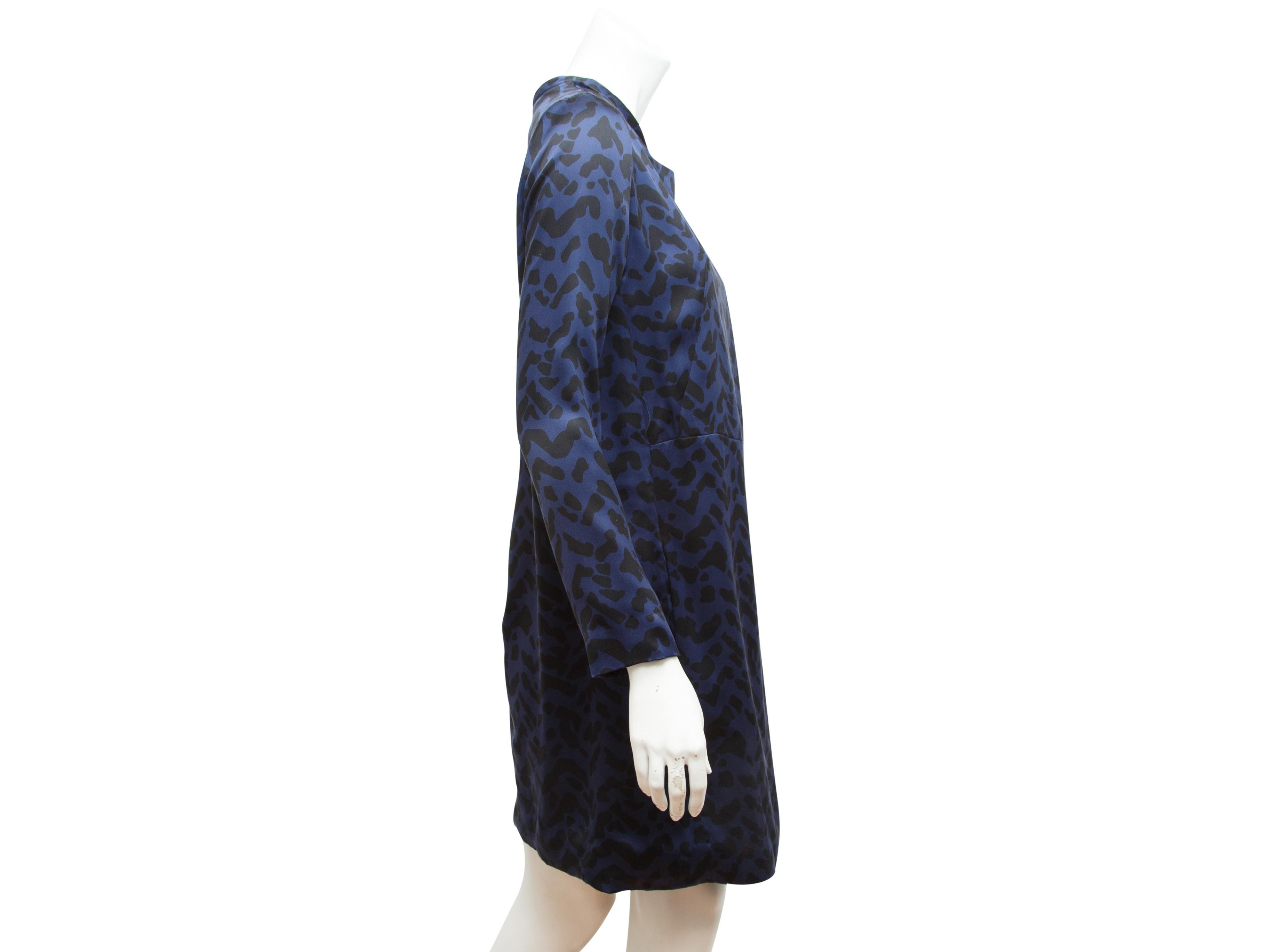 Product details:  Navy blue and black animal-printed silk shift dress by Chloe.  Draped neck.  Long sleeves.  Back tapered pleat.  Label size FR 36.  35
