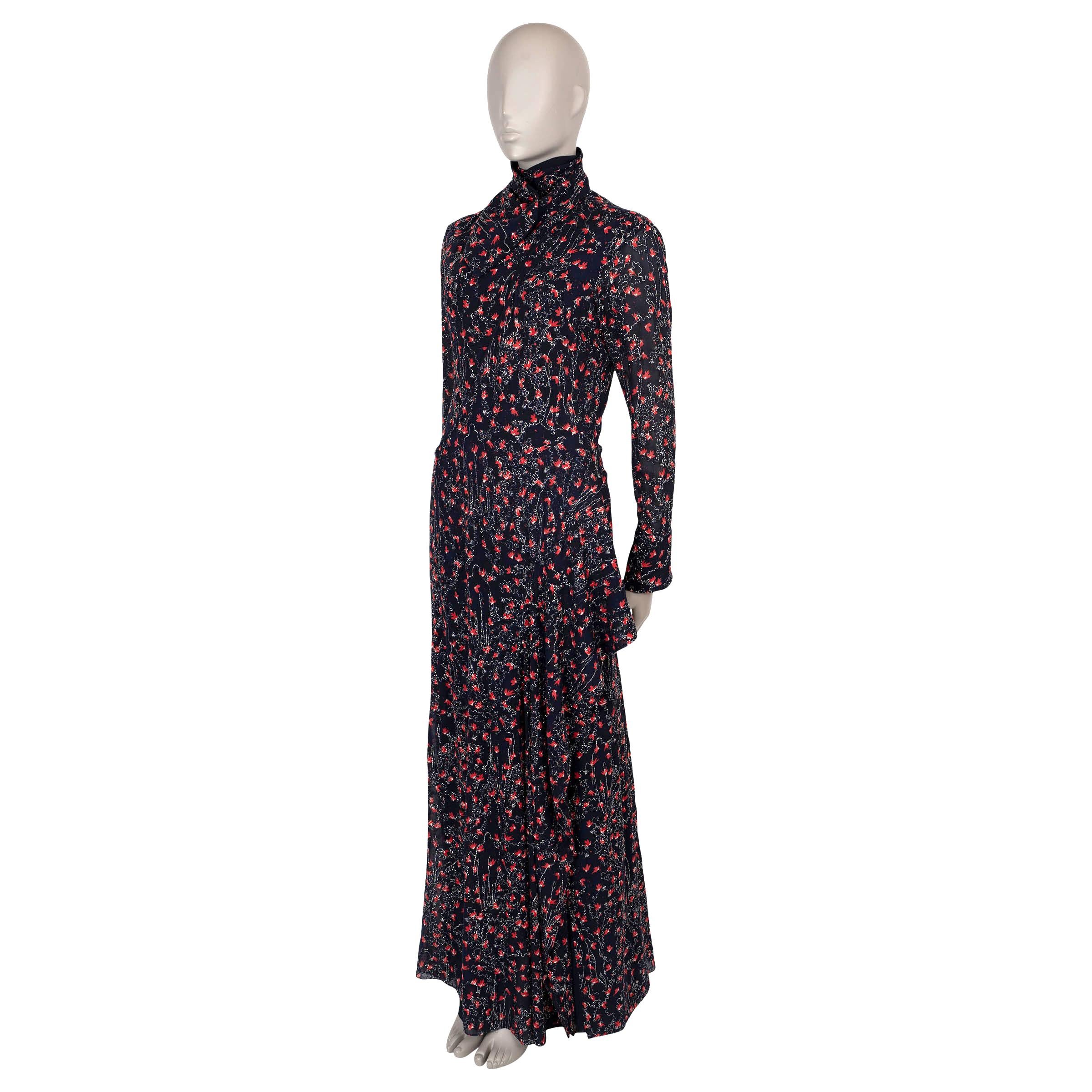 This 100% authentic Chloé Aquatic maxi dress in navy blue and red floral-print georgette silk (100%) is beautifully embroidered with silver lurex thread, adding a touch of shimmer to its flowing design. It features an asymmetric cut-out at the