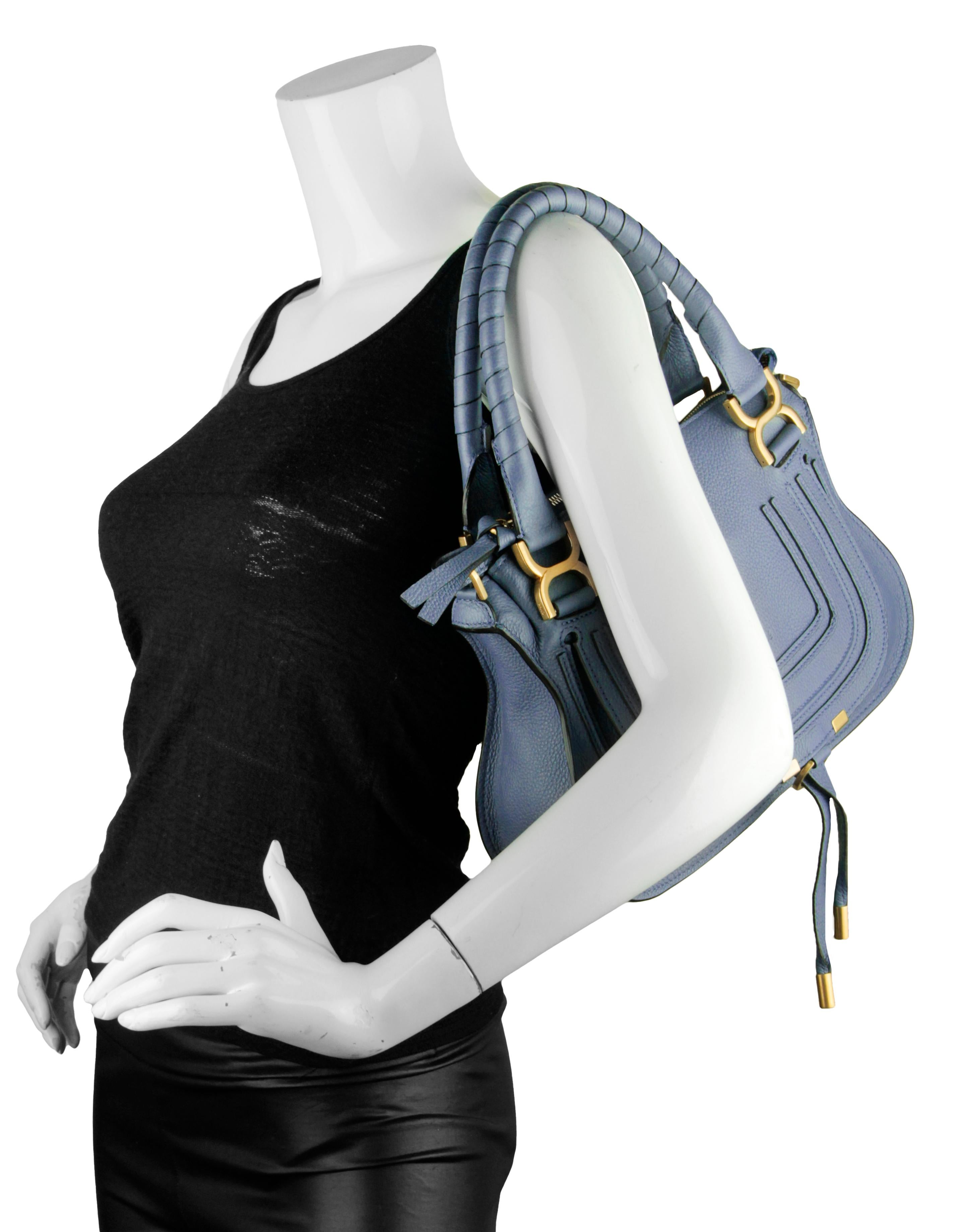 Chloe Graphite Navy Leather Small Marcie Satchel Bag

Made In: Italy
Color: Graphite navy
Hardware: Goldtone
Materials: Grained calfskin leather
Lining: Cotton lining
Closure/Opening: Zip top
Exterior Pockets: Front slit pocket under flap
Interior
