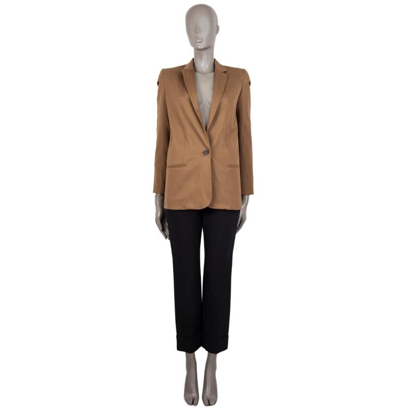 authenticChloe blazer in ochre virgin wool (98%) and elastane (2%)- With buttoned cuffs, two welt pockets on the front, and slit on the back. Closes with urea button on the front. Lined in brown cotton (65%) and silk (35%). Has been worn and is in