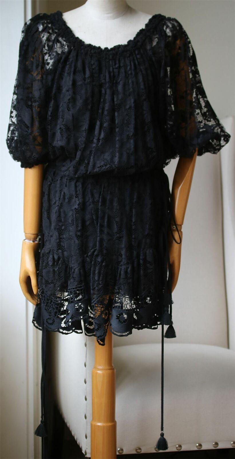 Fashioned in Italy, this cotton-blend long sleeve mini dress features an elasticated waist and cuffs, self-tie belt with tassel details, balloon sleeves and elasticated shoulder which provides a comfortable, snug fit. Black, off-shoulder lace dress.