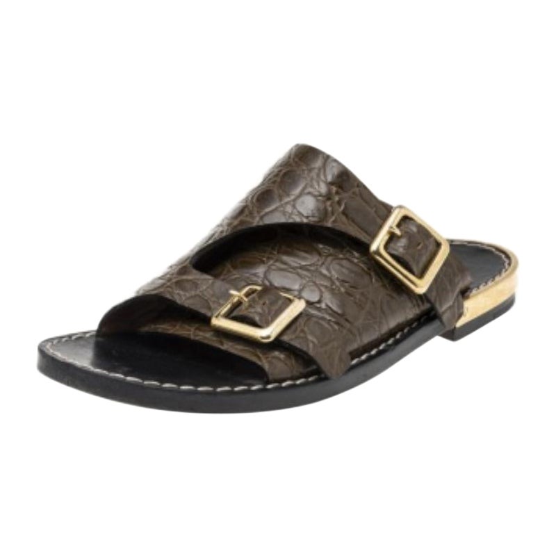 Look glamorous no matter what as you wear with these beautiful sandals from Chloe. They have been crafted using olive-green croc-embossed leather on the exterior and showcase gold-toned buckle details on the upper, a slip-on style, and leather-lined