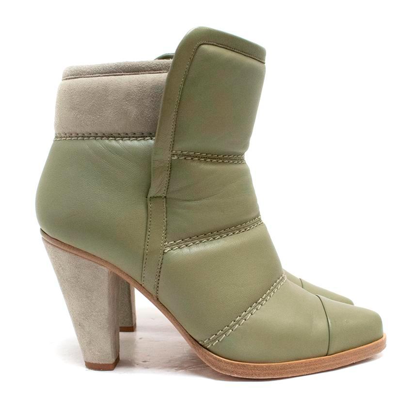Chloe olive green heeled slip-on padded leather ankle boots  with pointed toes and decorative stitching. 

Approx:

Length: 26 cm
Width: 8 cm
Height:16 cm
Heel:9 cm