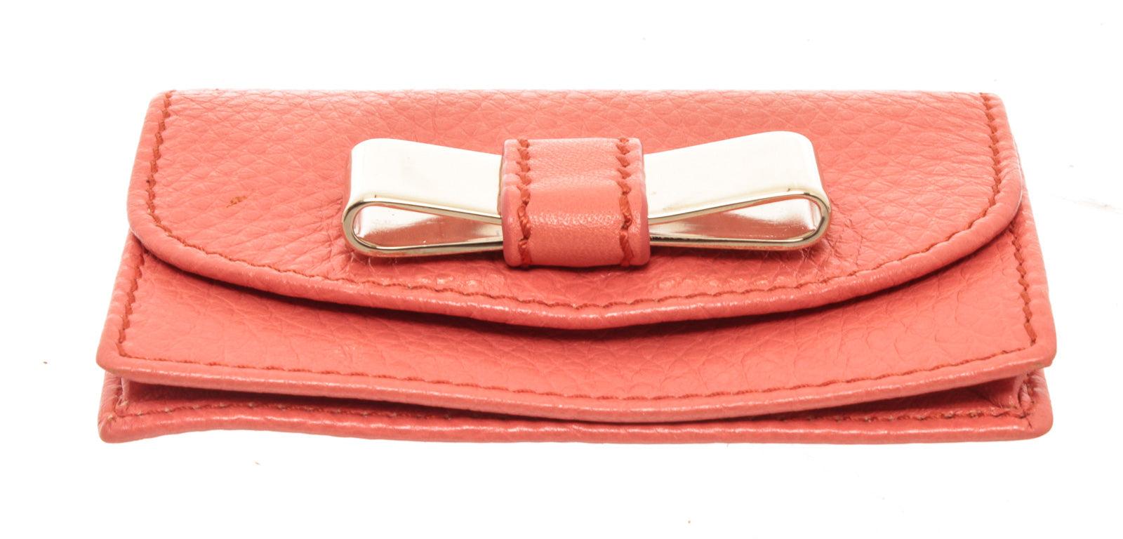 Orangefarbenes Portemonnaie aus Leder mit goldener Schleife und Lederwaren, Leder Damen
